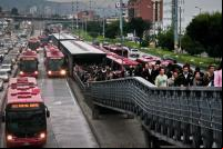 New research shows that bus rapid transit (BRT) systems like Bogotá's TransMilenio (pictured) have a wide range of benefits for quality of life in cities. Photo credit: EMBARQ 